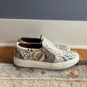 Report python slip on sneakers